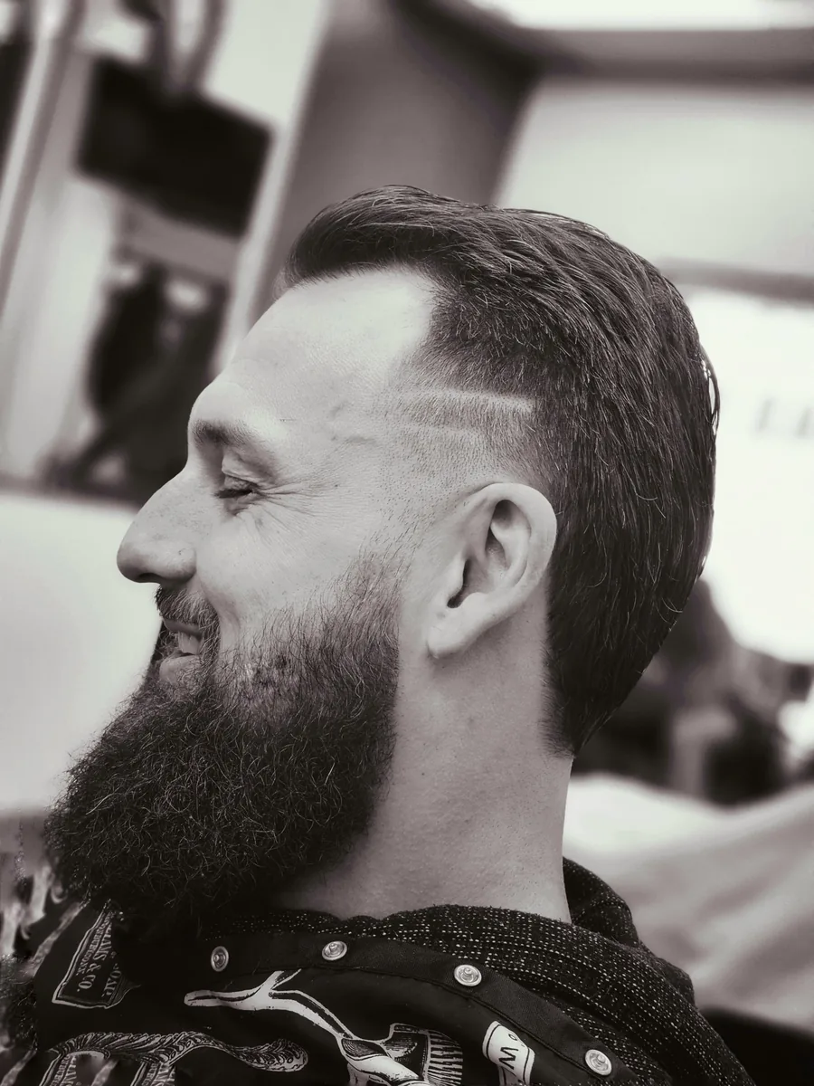 Men's beard taper and slick-back haircut at Willow Road Barber Shop in Guelph