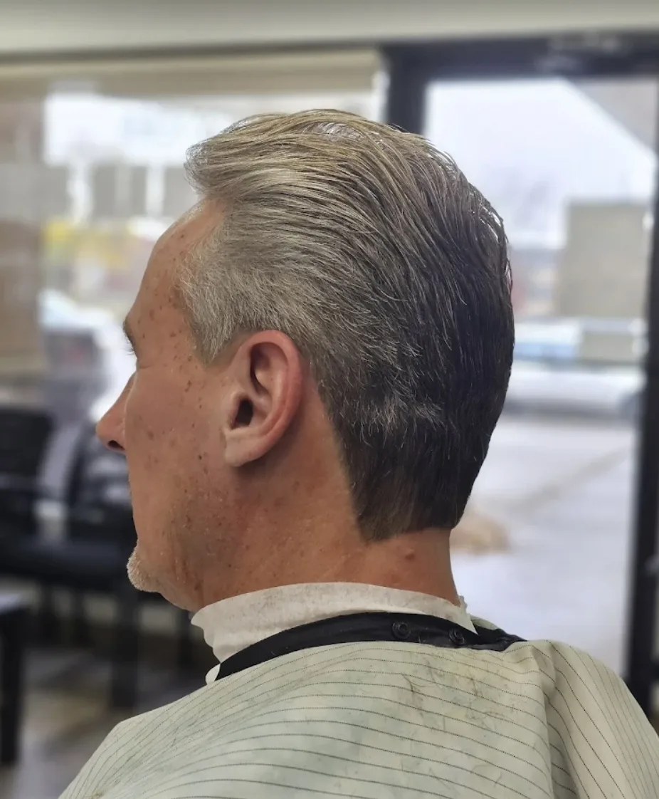 Clean classic taper haircut on grey hair at Willow Road Barber Shop in Guelph