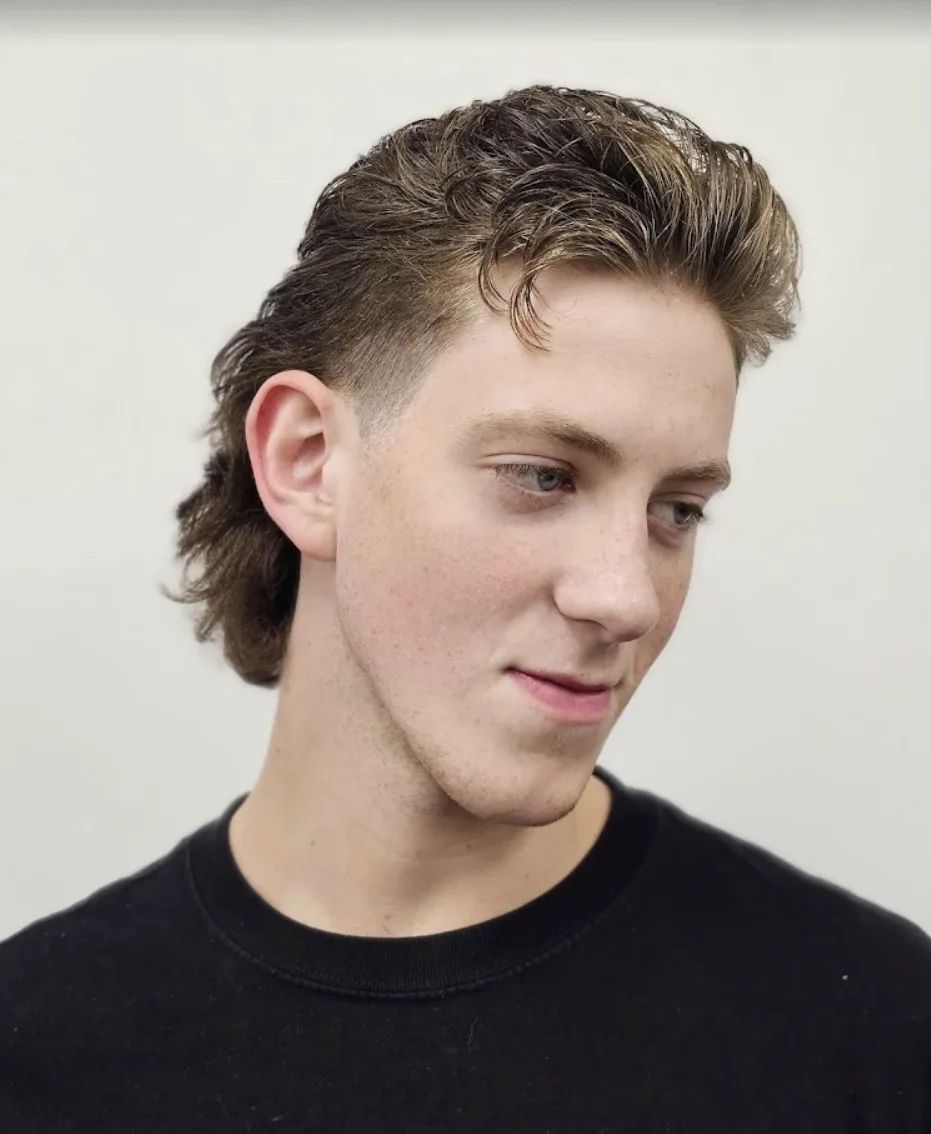 Men's modern mullet haircut side profile at Willow Road Barber Shop in Guelph