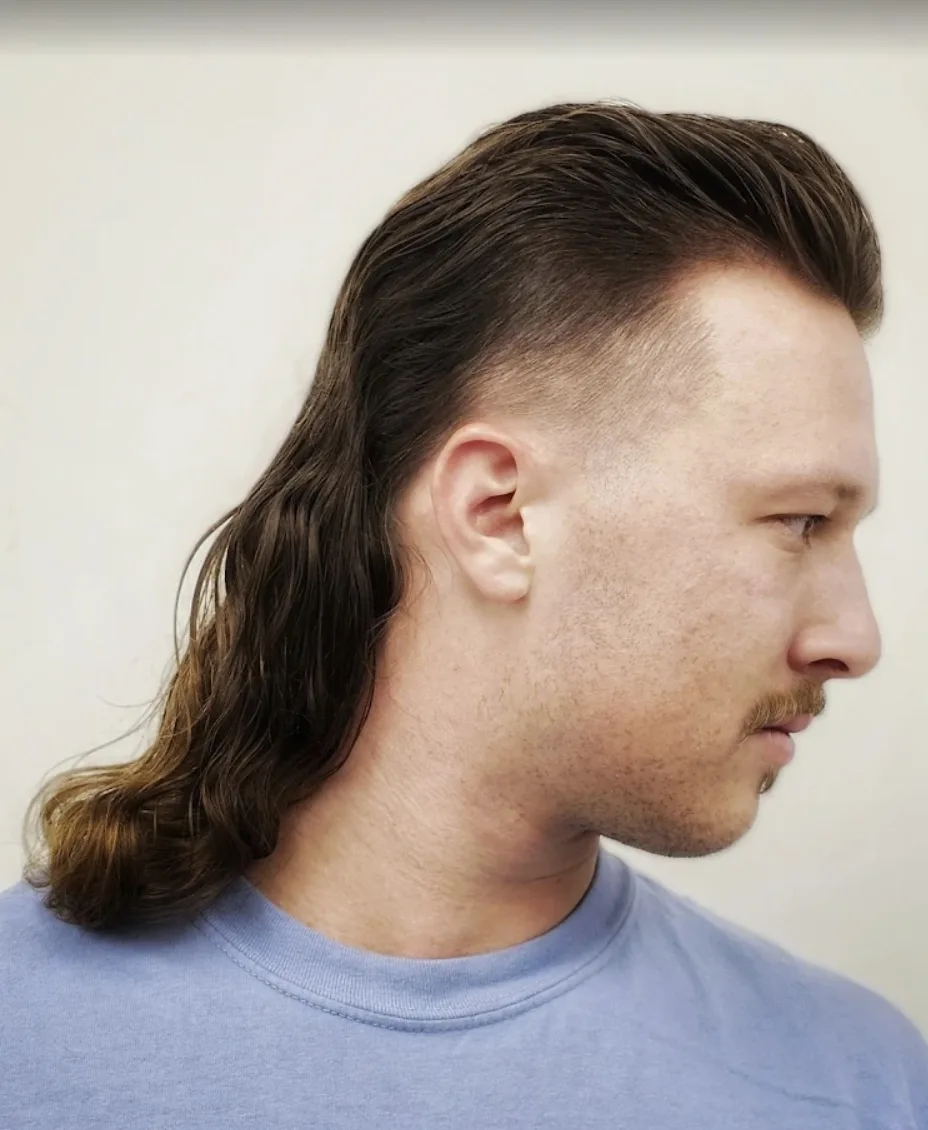 Men's mullet with bald fade at Willow Road Barber Shop in Guelph