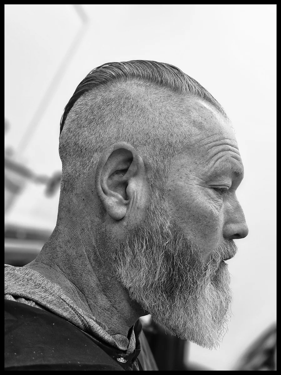 Distinguished men's slick-back and beard trim at Willow Road Barber Shop in Guelph