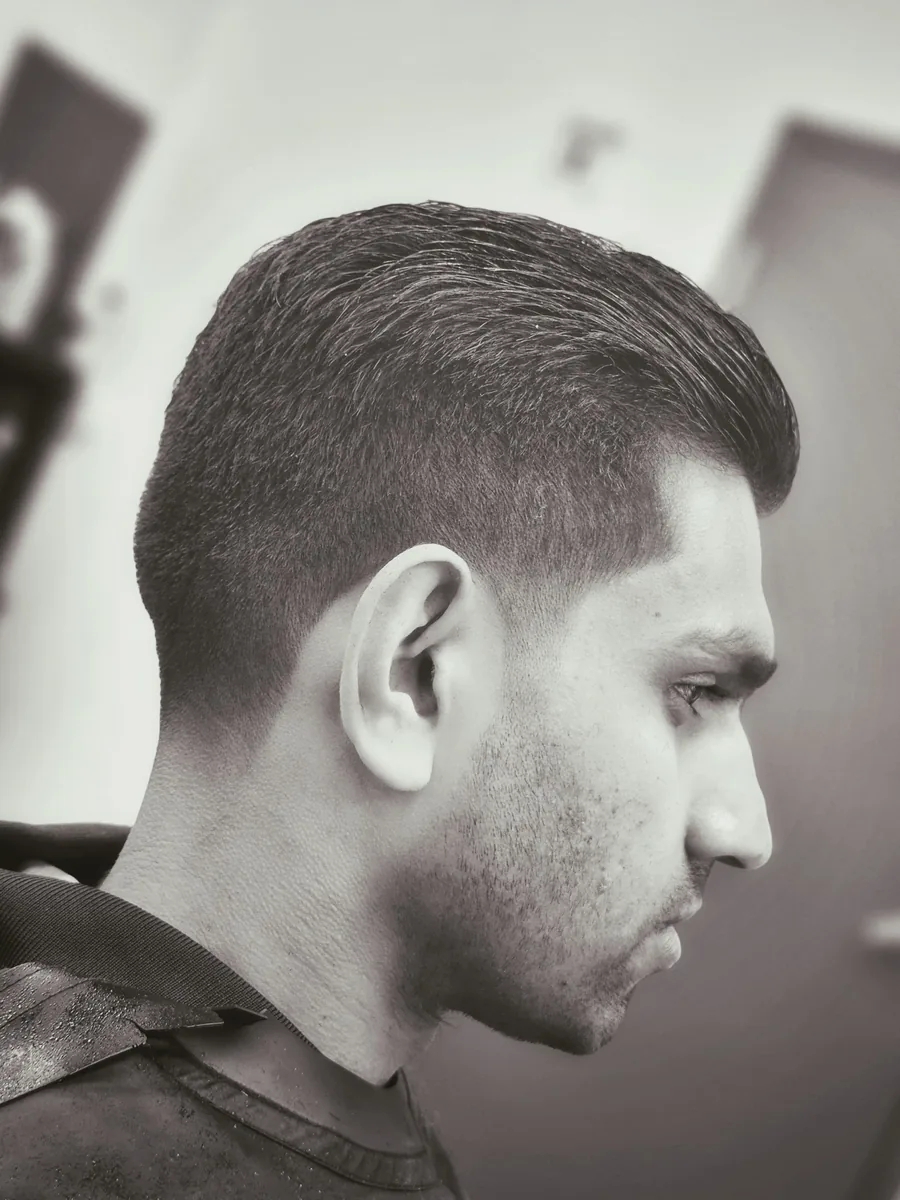 Men's undercut slick-back fade at Willow Road Barber Shop in Guelph